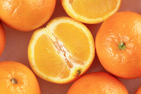 Oranges in a bowl on a white background. Top view.の写真素材