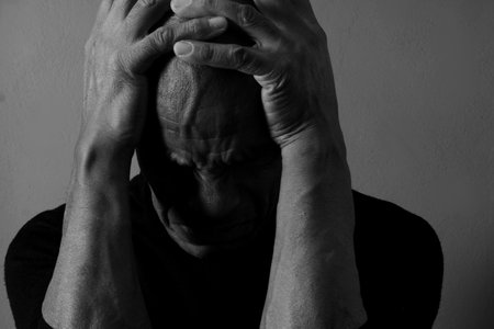 praying to god on gray black background with people stock image stock photoの写真素材