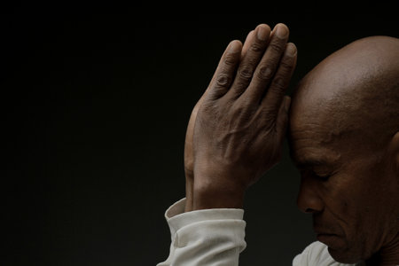 praying to God  on black background