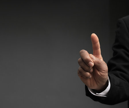 businessman hand pushing on a touch screen interface with copy space.の写真素材