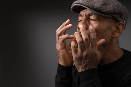 praying to god on gray black background with people stock image stock photoの写真素材