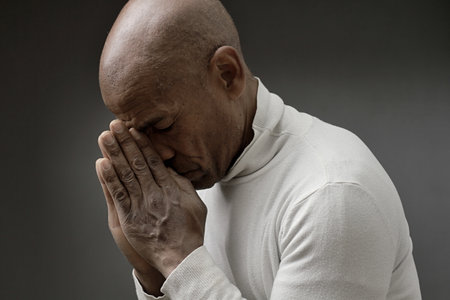 praying to god on gray black background with people stock image stock photoの写真素材