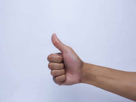 thumb up on white background, Thumbs up sign, Thumbs up symbolの写真素材