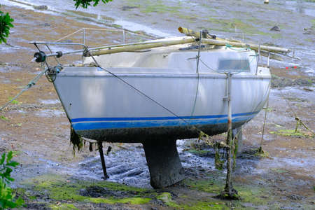 Sailboat on its keel.