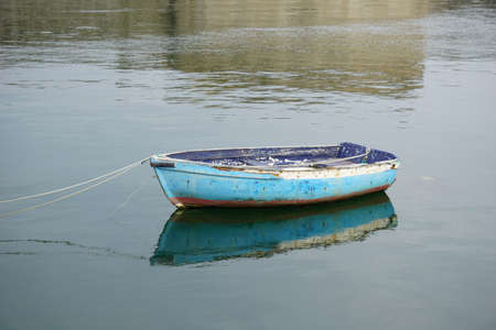 Artisanal fishing, blue wooden boat.の写真素材
