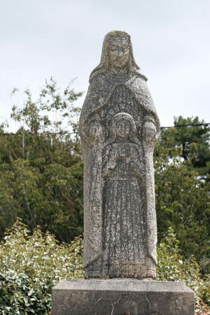 The Virgin and Child, granite statue.の写真素材