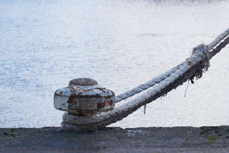 Rope and mooring post for boat.