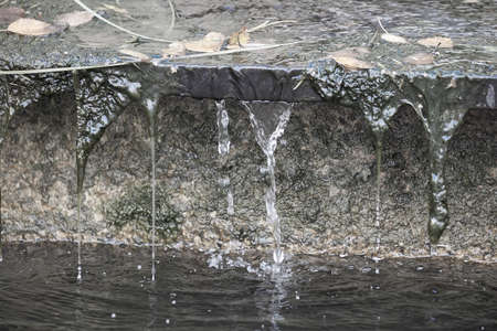 Water flowing from the fountain.の写真素材