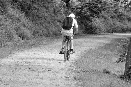 Man riding a bicycle.の写真素材