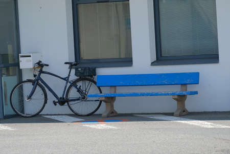 Bike leaning against a wall.の写真素材