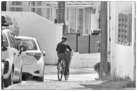 Cyclist in town.の写真素材