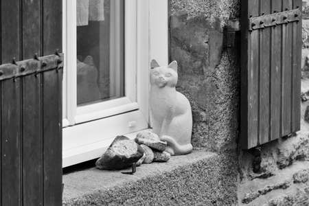 Seated earthenware cat.の写真素材