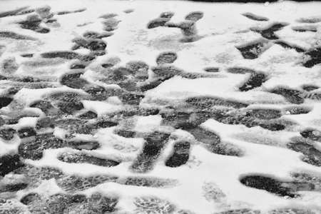 Footprints on the frozen ground.の写真素材