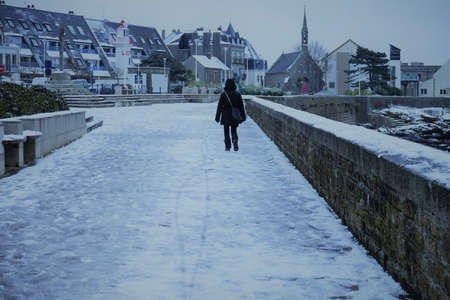 Silhouette walking in the snow.の写真素材