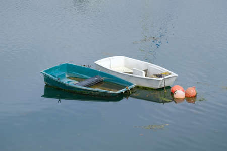 Boats filled with water.の写真素材