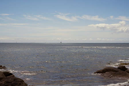 Sailboat on the horizon.の写真素材