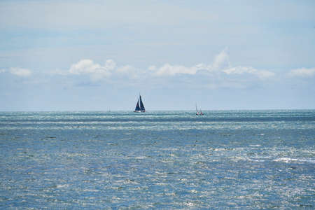 Sailboat and horizon line.の写真素材