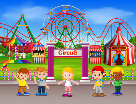 Childrens having fun in amusement park at daytimeの写真素材