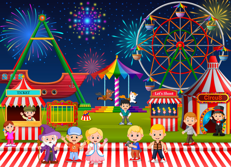 Many Childrens and people worker having fun in amusement park at nightの写真素材