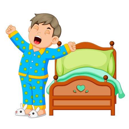 A boy wake up and stretching in morningの写真素材