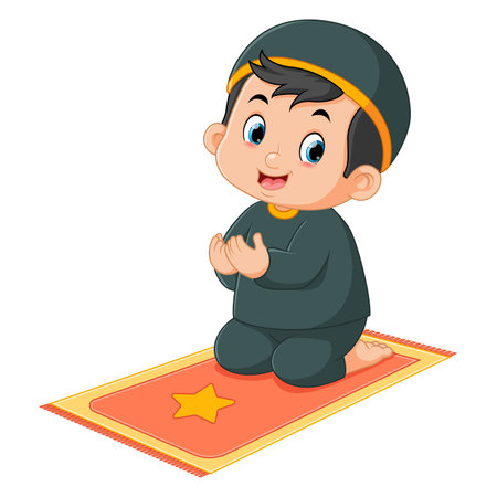 a cute Muslim boy is praying on his prayer mat of illustrationのイラスト素材
