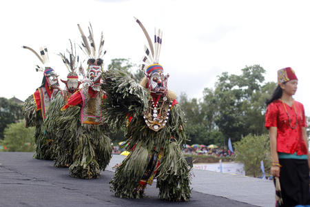 Tenggarong, July 2017 hudoq dancer of dayak perform in erau International folk art festival in tenggarong.のeditorial素材