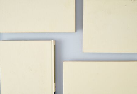 Top view of a formation of books forming a cross, concept photo