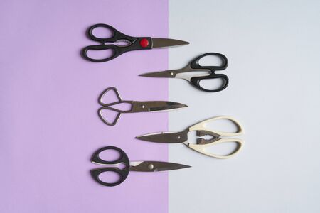 top view of 5 scissors on duotone background, Top view
