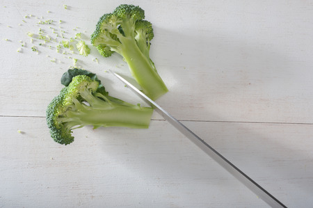 Close up of a brocoli cut by knifeの写真素材