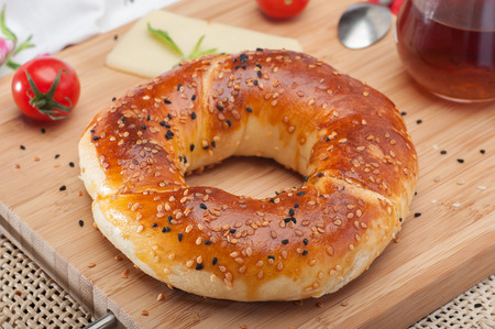 Close up of traditional Turkish bagel acma with cheese and tomatoesの写真素材