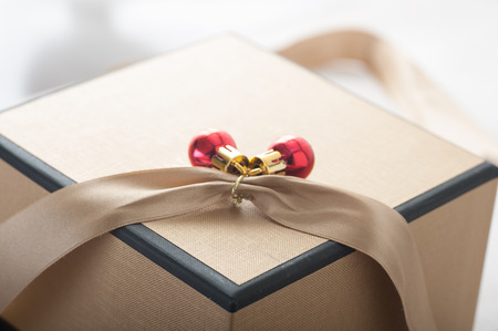 Close up of a shiny gold gift boxの写真素材