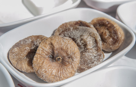 Close up of a plate of dried figsの写真素材