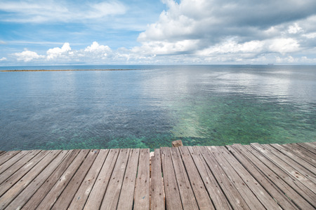 Traditional Wooden Dock and Beautiful Tropical Seaの写真素材