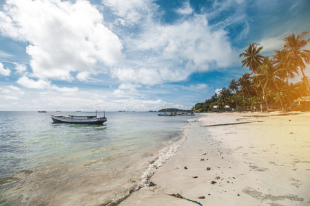 Traditional Fishing Boat and Beautiful Tropical Beachの写真素材