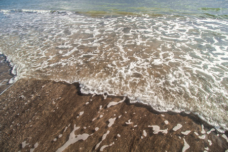 Beautiful Wave and Sand at Tropical Beachの写真素材