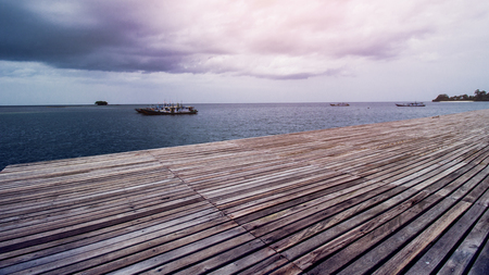 Wooden Beach Dock, Wooden Pier at Beautiful Tropical Seaの写真素材