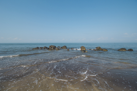 Clear Sea Water, Granite Rock, Cloudy Blue Sky and Tropical Beachの写真素材