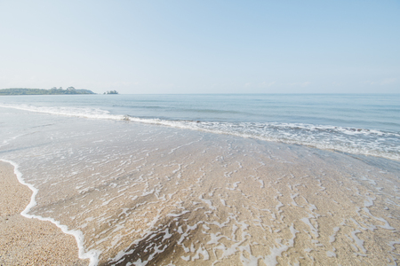 Clear Sea Water, White Sand, Cloudy Blue Sky and Tropical Beachの写真素材