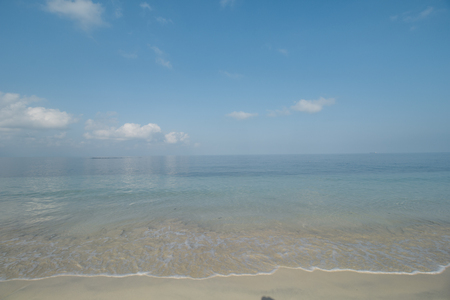 Clear Sea Water, White Sand, Cloudy Sky and Tropical Beachの写真素材