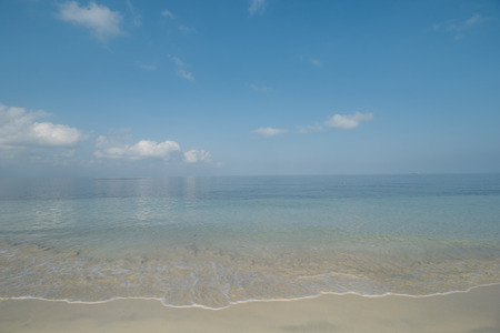 Clear Sea Water, White Sand, Cloudy Sky and Tropical Beachの写真素材