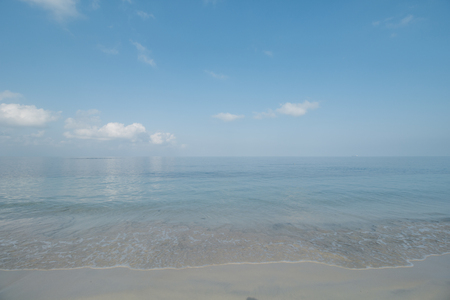 Clear Sea Water, White Sand, Cloudy Sky and Tropical Beachの写真素材