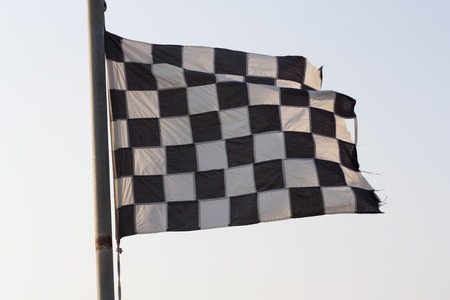 Checkered Flag and blue sky photo