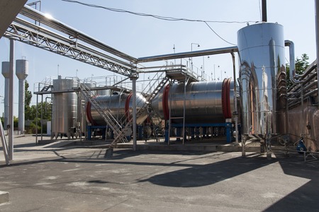 Modern aluminum barrels for wine in wine factory photoの写真素材