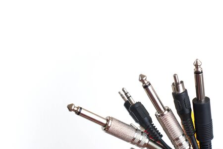 Audio cables and connectors on white background. Recording studio, music industry, sound equipment...