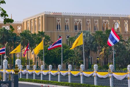 National and royal flags of Thailand flown at the front of the Government House of Thailand, in Bangkok.のeditorial素材