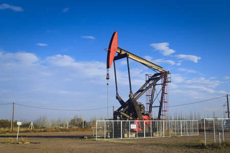 Oil extraction pumpjack in the desert of Mendoza, Argentina.