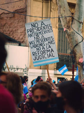 2020-10-12, Mendoza, Argentina: During a protest against the government, a sign reading "No to antidemocratic presidents, no to thieving vicepresidents, no to the judicial reform"のeditorial素材