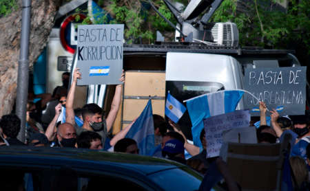 2020-10-12, Mendoza, Argentina: During a protest against national government, a man holds a sign...