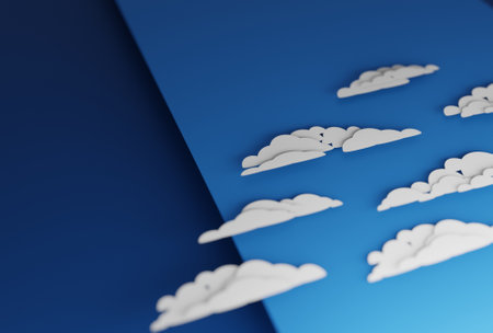 Puffy clouds on blue sky, in flat papercut design. Digital render.の写真素材