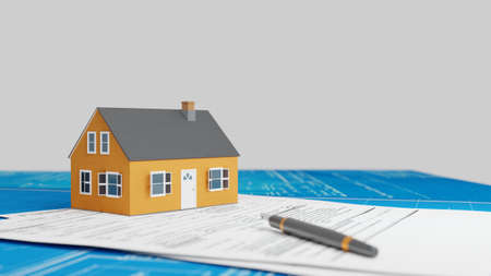 Real estate business, house building concept. Suburban house model with blueprints and legal papers....